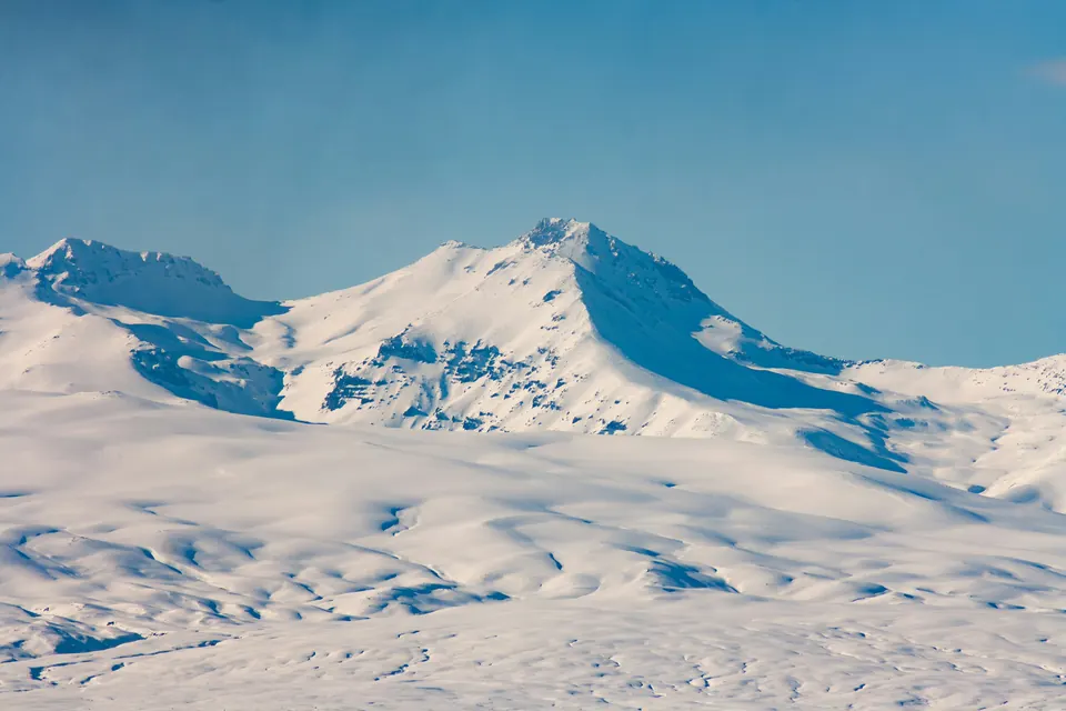 The snow-covered summits of Mount Aragats