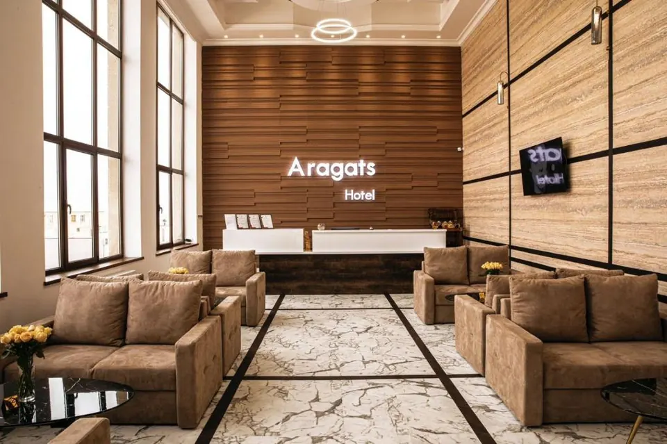 Reception and lobby with the Aragats Hotel sign