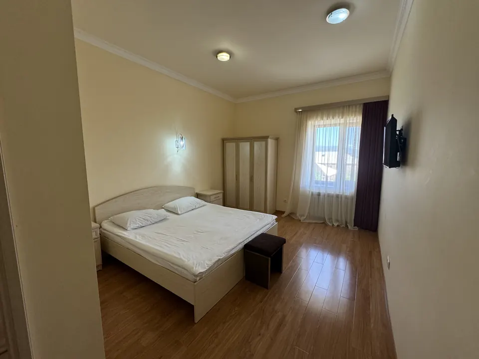 Standard Room with a double bed and wooden floor